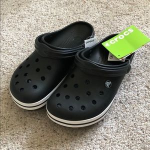 Black and white crocband crocs
